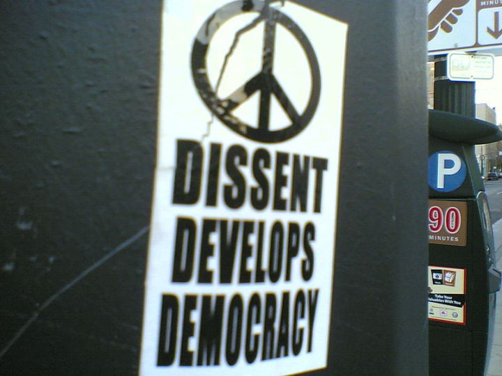 800px-Dissent_develops_democracy_sticker